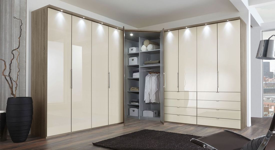 Eck-Kleiderschrank Tiko Eiche Dekor mit Schubladen, Spiegel und Glasfront