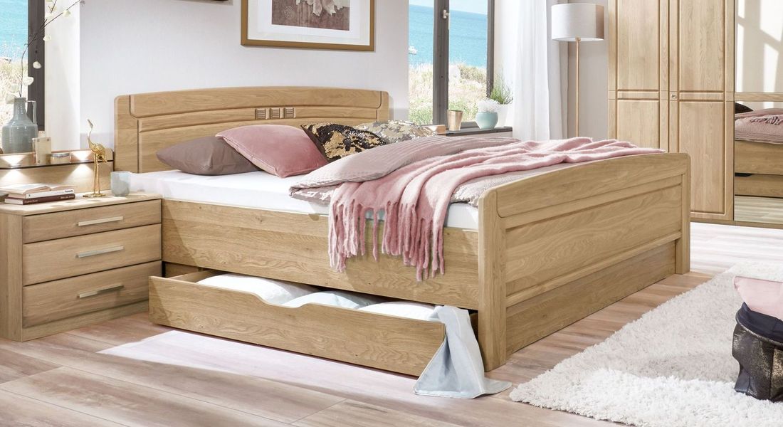 Bett Bloomfield Komfort Eiche teilmassiv mit Schubkasten