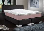 Boxspringbett mit hervorgehobener Matratze